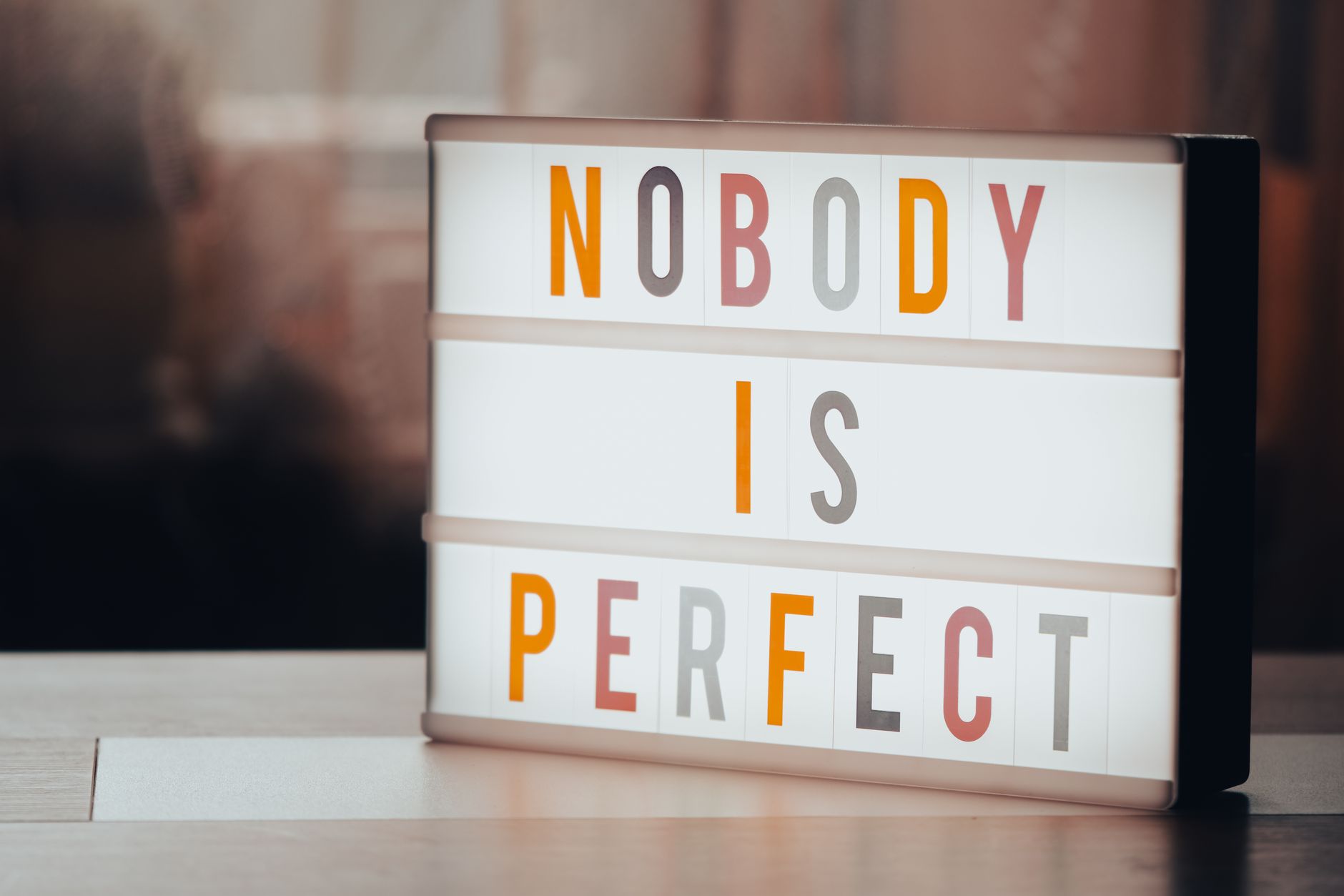 nobody is perfect text on a letter board